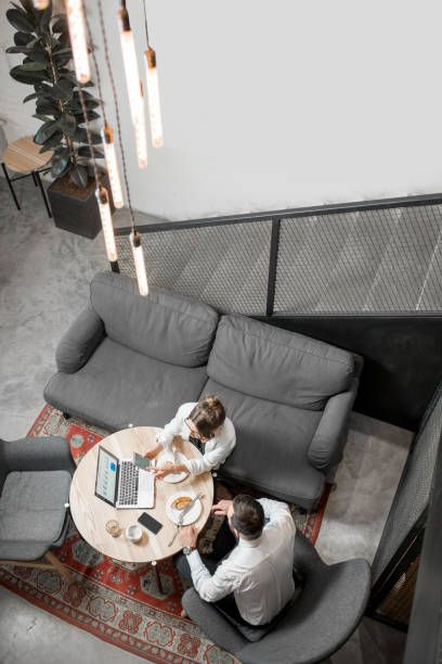 istock Business couple at the cafe 939771062