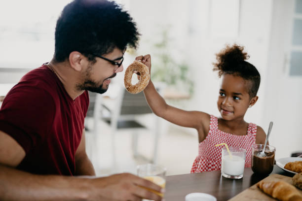 istock Do you want to eat a bagel daddy? 939788018