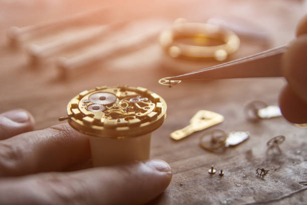 istock Process of installing a part on a mechanical watch, watch repair 939794954