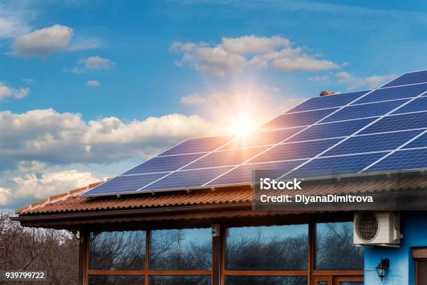 Solar Panel On A Red Roof Stock Photo - Download Image Now - Solar Panel, Solar Energy, Sun