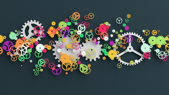 Background of multi colored gears cut-out from paper, 3D
