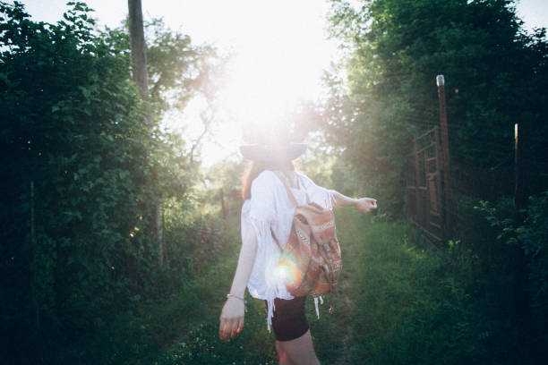 istock Young woman resting in the forest 939806992