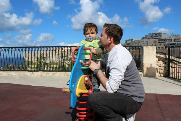 istock One year old baby boy on the playground 939807278