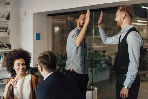 istock High five for a job well done 939808244