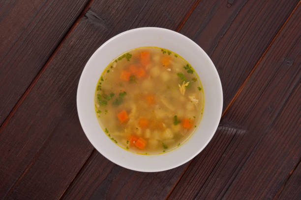 istock Tasty bread soup with vegetables on a table 939812390
