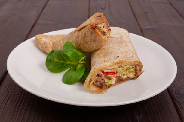 istock Tasty vegetarian tortillas on a table 939812394