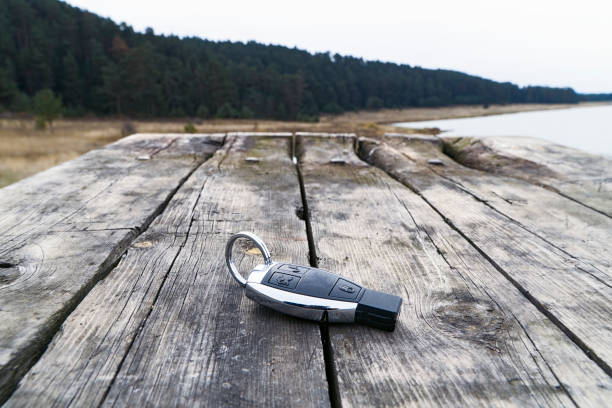 Car Key on the table close-up Car Key on the Wood car keys table stock pictures, royalty-free photos & images