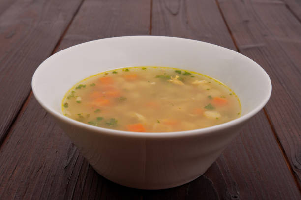 istock Tasty bread soup with vegetables on a table 939812750