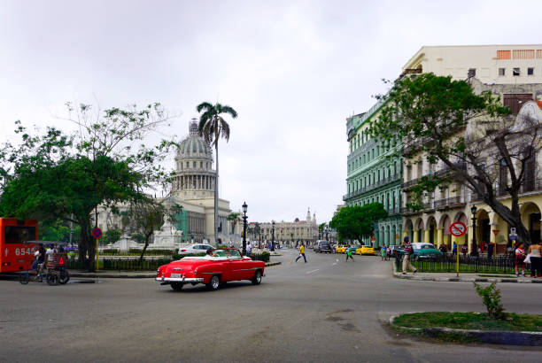 Havana Streets /Cuba - January 24, 2018: The streets of Havana is full of interesting people and old American cars for the photographers at Cuba