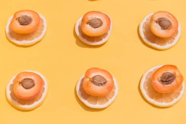 istock Halves of apricots, lemons 939817890