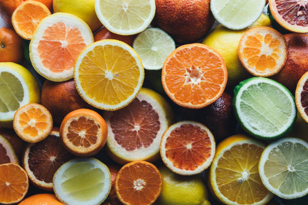 istock Mix of different citrus fruits closeup 939825718