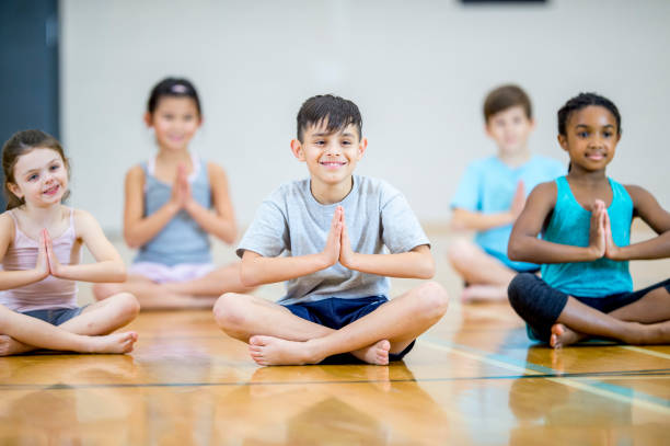 istock Learning to meditate in gym 939825766