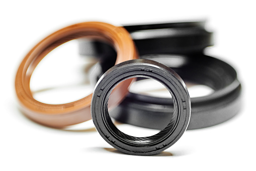 Oil seal on a white background with shallow depth of field