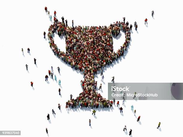 Human Crowd Forming A Trophy Shape Success Concept Stock Photo - Download Image Now