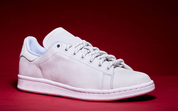 White Tennis Shoe - Red Background