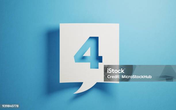 White Chat Bubble On Blue Background Stock Photo - Download Image Now - Number 4, Concepts, Speech Bubble