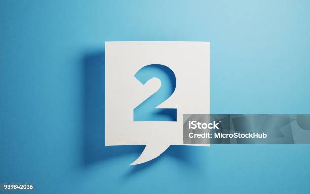 White Chat Bubble On Blue Background Stock Photo - Download Image Now - Number 2, Number, Second Place
