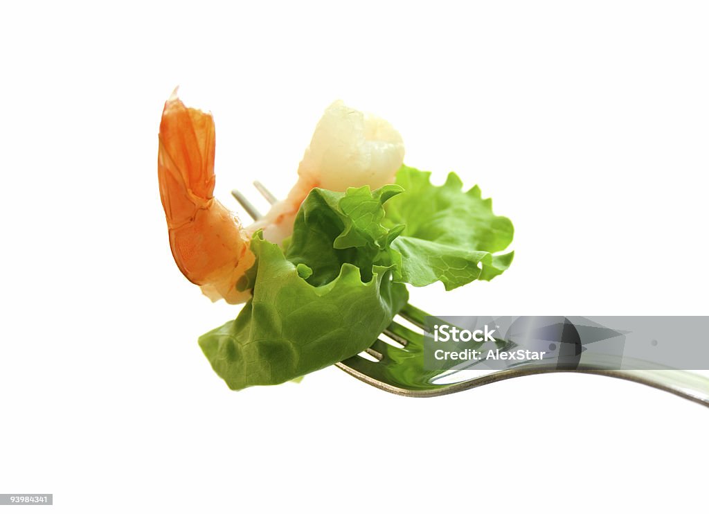 shrimp and lettuce shrimp and lettuce on a fork Animal Shell Stock Photo