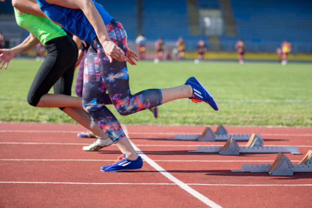 istock Women ready to race on track field 939848452