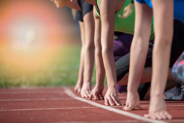 istock Women ready to race on track field 939848872