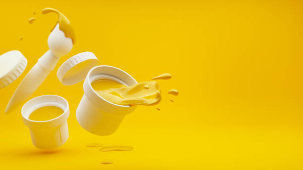 istock Yellow paint with splashes and art brush 939851856