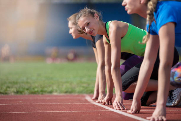 istock Women ready to race on track field 939852030
