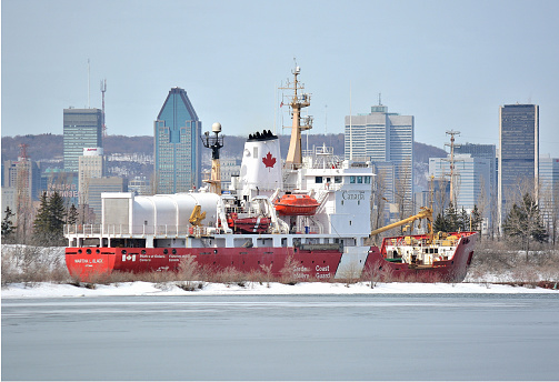 Transportation...This beautiful photo with the Montreal skyline behind, was taken in March of 2018, and happens every spring at this time. We see here a Canadian Federal Government ice breaker, beginning to break up the ice in the seaway channel, to hasten the melting of the ice pack. After the long winter, the intention is to open all the locks, and get shipping moving again throughout the entire St Lawrence Seaway system which operates from the Great Lakes, to here in Montreal.