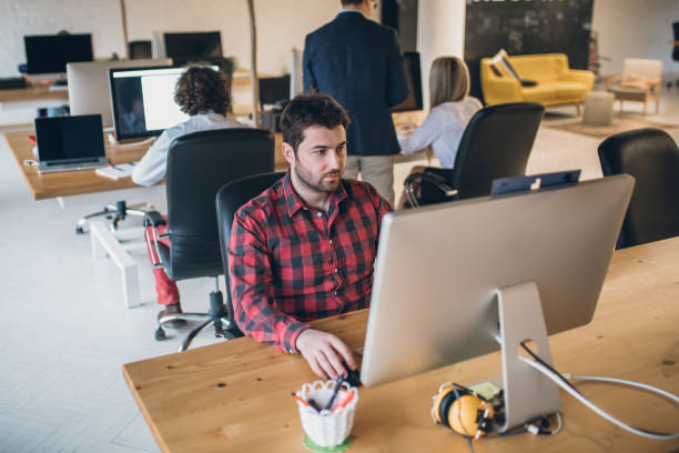 istock Five more minutes untill the cofee break 939859702
