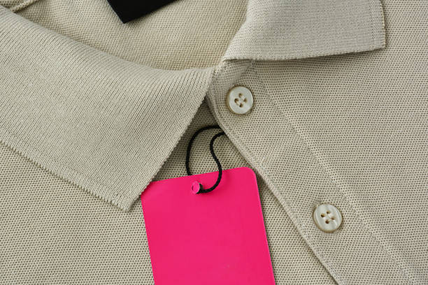 istock Light brown polo t-shirt and blank label. 939859878