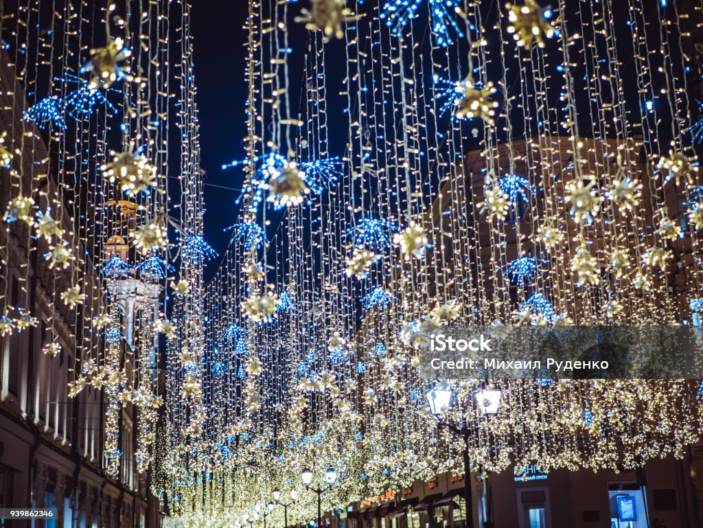 night city garland hanging outside in the street Abstract Stock Photo