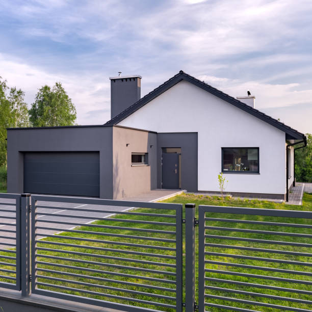 istock Villa with fence and garage 939866148