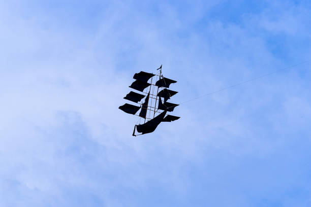 istock Kite on the blue sky looks like ship 939866500