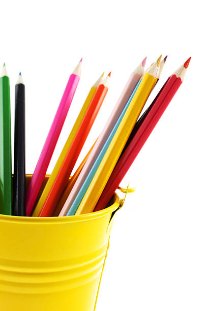 istock crayons in yellow bucket 93986815