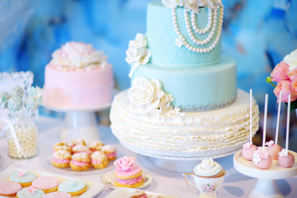 istock Beautiful desserts, sweets and candy table at wedding reception 939870846