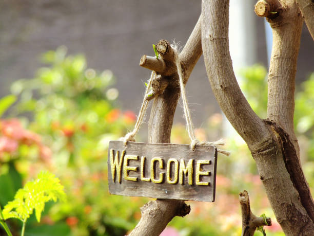 istock welcome sign hanging in the garden 939887796