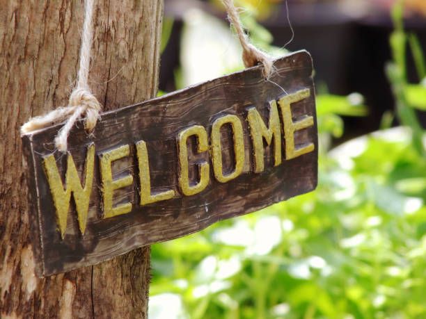istock welcome sign hanging in the garden 939887846