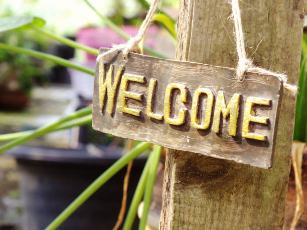 istock welcome sign hanging in the garden 939890238