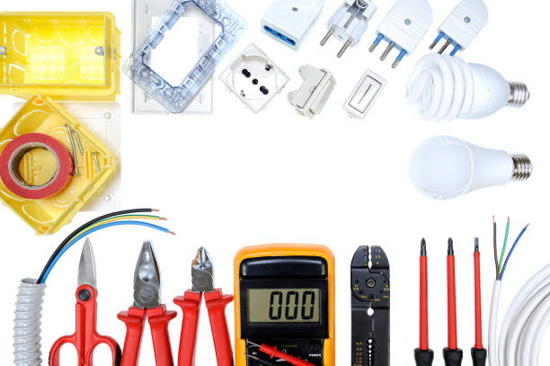 Top view of work tools and components for residential electrical installation on white background. Close up of work tools and components for residential electrical installation isolated on white background. Space for text / announcement cable tester stock pictures, royalty-free photos & images