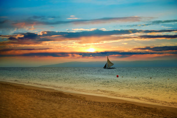 Dramatic red cloudscape sunset on the Beach, Montrouis, Haiti