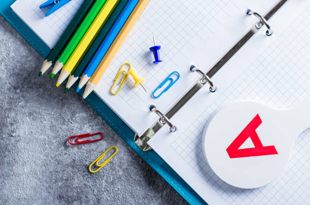 School supplies on wooden background