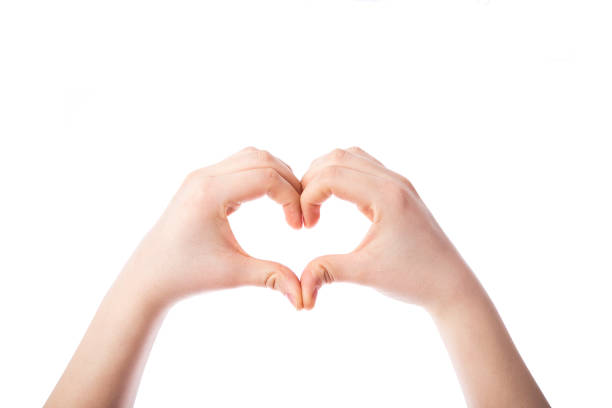 istock Female hands in the form of heart 939914968