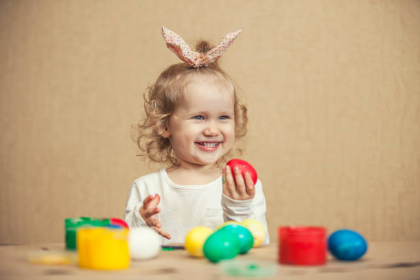 Small cute baby color Easter eggs on the table in colors, decor, happy Easter!