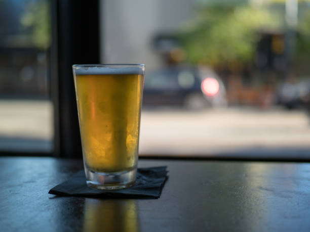 istock Frosty beer in a bar looking outdoors 939915720