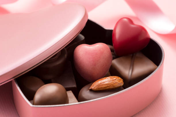 istock chocolate assortment in heart shaped gift box 939920646
