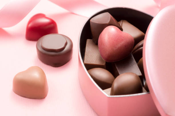 istock chocolate assortment in heart shaped gift box 939920806