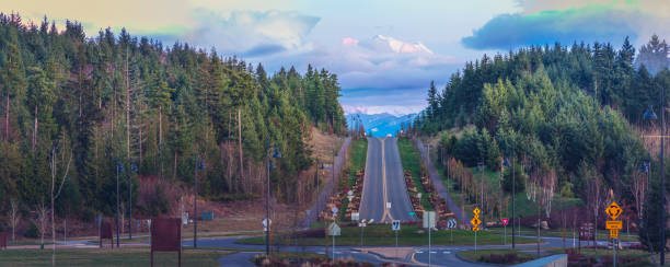 urban traffic at dusk,Mt.Rainier on background