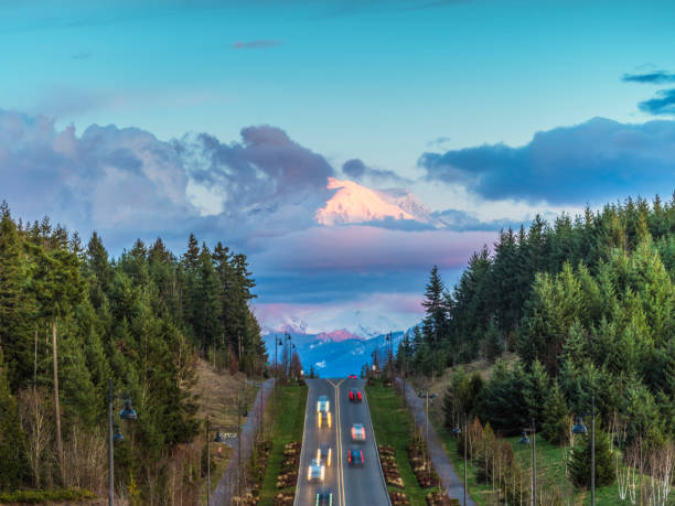 urban traffic at dusk,Mt.Rainier on background,seattle,washionton state,usa.