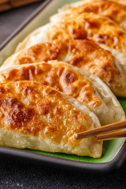 istock Plate of asian gyoza, dumplings snack 939926314