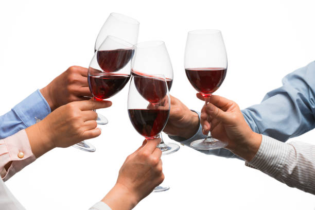 People have a toast with red wine