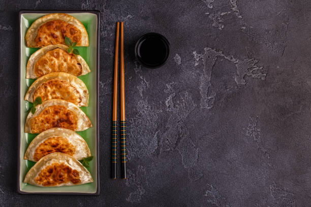 istock Plate of asian gyoza, dumplings snack 939926552